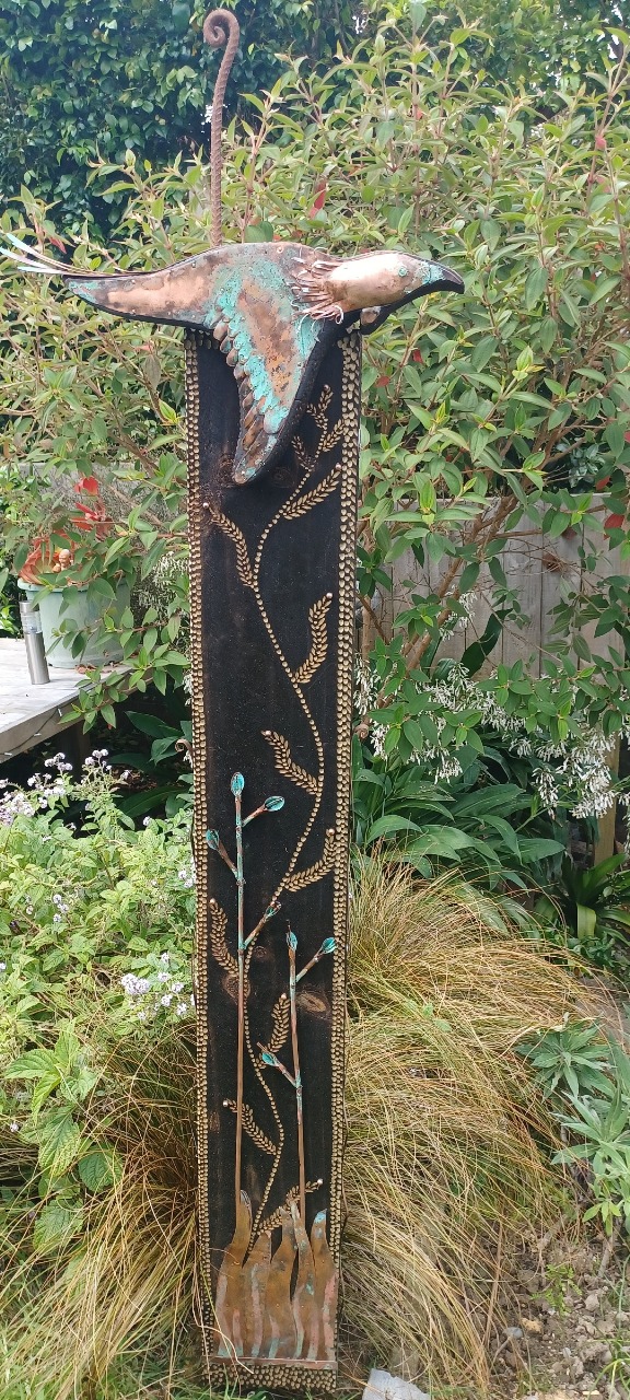 Scorched wooden tui with copper SOLD $450